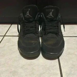 Worn Jordan 4 black cats